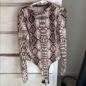 Snake print turtleneck body suit. Long sleeve.